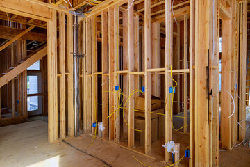 Fototapeta na wymiar New home construction framing of a house under construction