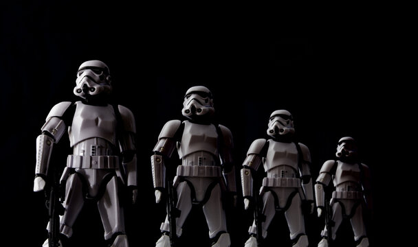 NEW YORK, USA - JULY 29 2016 - Star Wars Stormtroopers lined up with dramatic lighting - Hasbro Black Series 6 inch action figures.