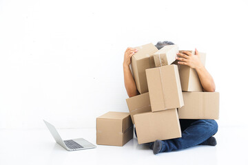 Entrepreneurs do business online, deliver products by mail Sitting stressful with the product pile That cannot be sold to customers Due to being affected during the coronavirus. white background