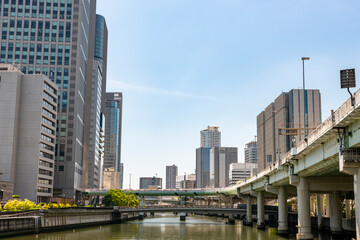Obraz premium Office buildings along Dojima river in Osaka, Japan