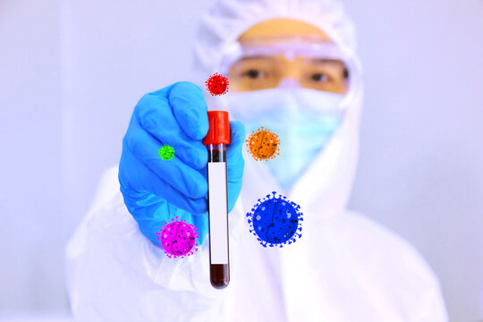 the doctor in protective suit holding blood teast tube in hand with corona virus illustration around blood test