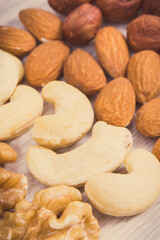Different nuts and almonds as source vitamins and minerals. Vintage photo