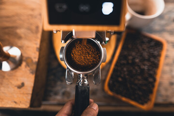 Ground coffee from a grinder at home