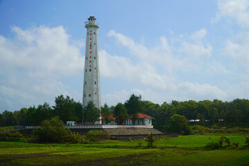 Fototapeta na wymiar Magnificent old lighthouse on the beach Ketawang Purworejo Central Java Indonesia