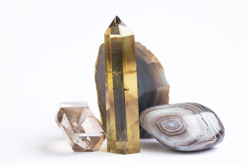 two natural quartz crystals on a white background close-up