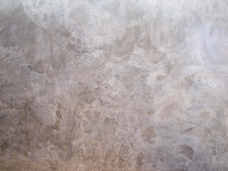 Textures or abstract backgrounds of cement walls. Loft style cement wall in reddish gray with space for text. Selective focus