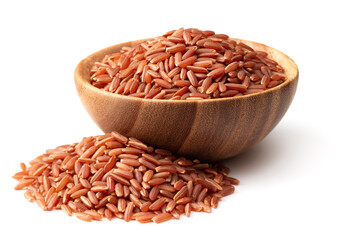 uncooked red rice in the wooden bowl, isolated on white background
