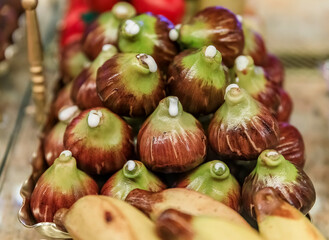 Fancy hand-made marzipan candy on display at the famous grocery store Eliseevsky in Saint Petersburg, Russia