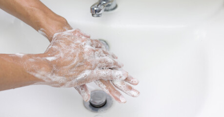 Washing hands with soap cleaning preventing  Corona virus or covid-19
