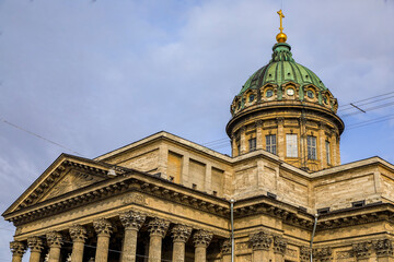 Obraz premium Exterior of Kazan Cathedral Nevsky Prospekt with an arc-shaped colonnade and a fountain in front of it in Saint Petersburg Russia