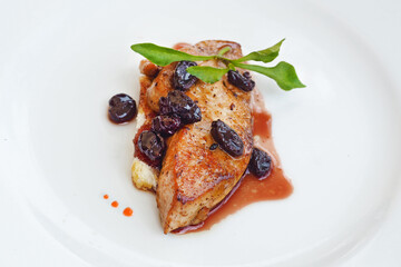 foie gras top with berries gravy sauce