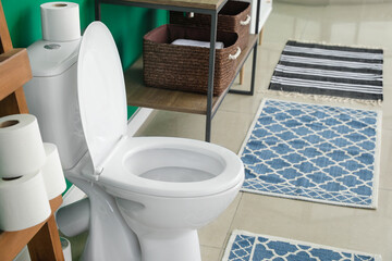Modern toilet bowl in interior of restroom