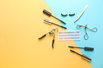 Mascara, eyelash extensions, tweezers and curlers on color background