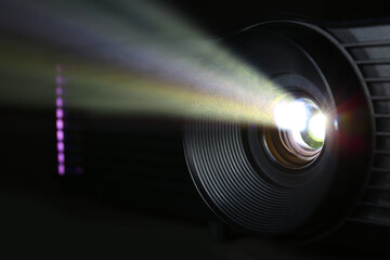 Glowing modern video projector, closeup