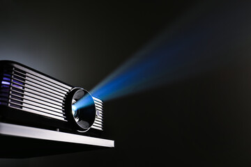 Modern video projector on dark background