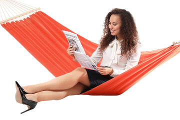 Young businesswoman with newspaper relaxing in hammock against white background - Powered by Adobe