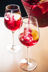 cold sangria with fresh fruits and berries
