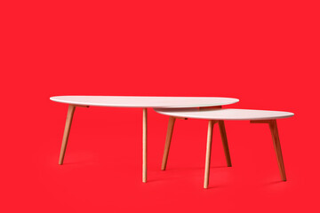Stylish tables on color background