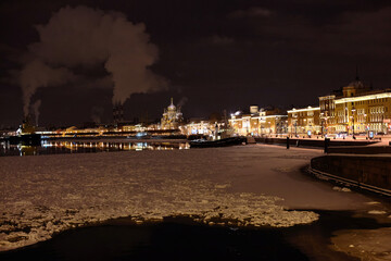 Fototapeta na wymiar Neva River at night in winter, Saint Petersburg