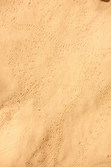 Fototapeta na wymiar Sand of the Sahara and footprints in the sand