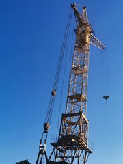 construction crane on a blue sky