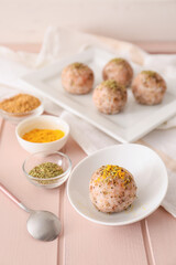 Traditional Japanese onigiri with spices on table