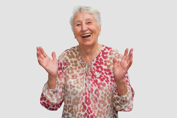 Full isolated portrait of a beautiful and happy senior woman