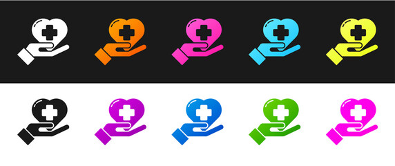 Set Heart with a cross icon isolated on black and white background. First aid. Healthcare, medical and pharmacy sign. Vector Illustration.
