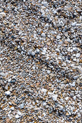 gray gravel stone road background vertical closeup with wave effect
