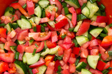 Healthy Fresh Salad with tomatoes cucumbers background texture