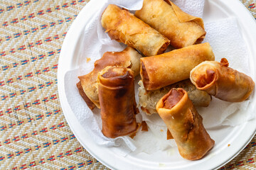 delicious and fried spring rolls stuffed with vegetables and shrimp