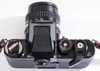 Top view of Vintage 35mm film camera on a white background