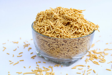 tasty crispy crunchy allu bhujiya namkeen in transparent  bowl