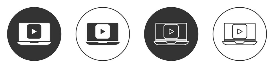 Black Online play video icon isolated on white background. Laptop and film strip with play sign. Circle button. Vector Illustration.