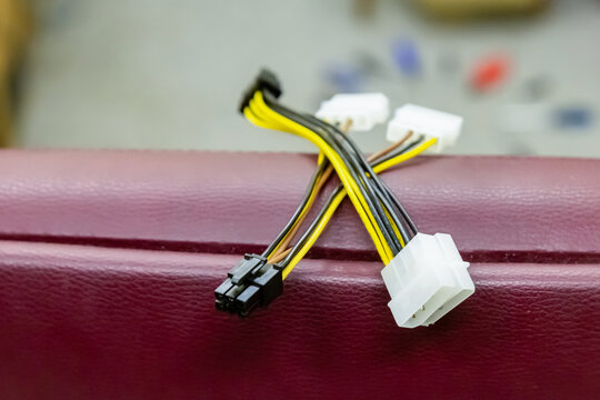 close-up computer power cable with 4-pin Molex connector for SATA adapter cable
