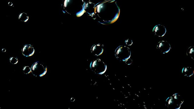 Soap Bubbles Grow and Burst on a Black Background. Beautiful Seamless Looped 3d Animation Ultra HD 4K 3840x2160