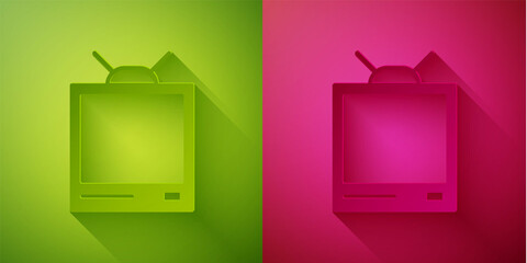 Paper cut Retro tv icon isolated on green and pink background. Television sign. Paper art style. Vector Illustration.