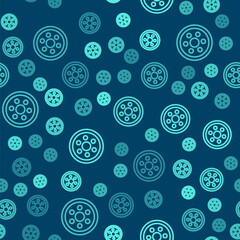 Green line Alloy wheel for a car icon isolated seamless pattern on blue background. Vector Illustration.