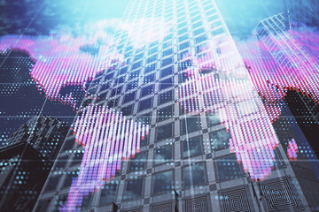 Double exposure of business theme hologram drawing and city veiw background. Concept of success.