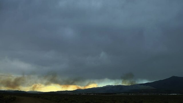 Brush Fire on Peavine Mountain in Reno Nevada with Stormy Skies