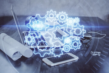 Double exposure of business theme icons and work space with computer background. Concept of success.