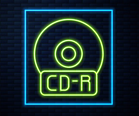 Glowing neon line CD or DVD disk icon isolated on brick wall background. Compact disc sign. Vector Illustration.