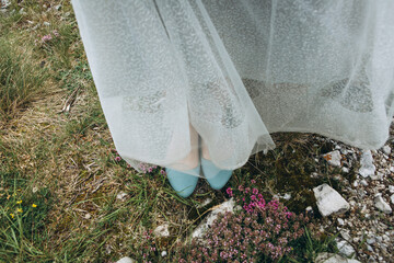 Close up of bride's shoes.
