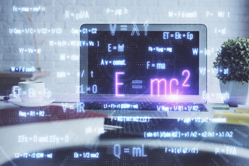 Desktop computer background and formula hologram writing. Double exposure. Education concept.