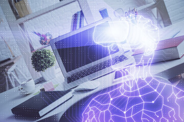 Computer on desktop with AR theme icon. Multi exposure. Concept of augmented reality.