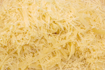 grated cheese texture background