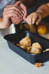 
children's hands make cookies