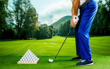 Golf player in a driving range