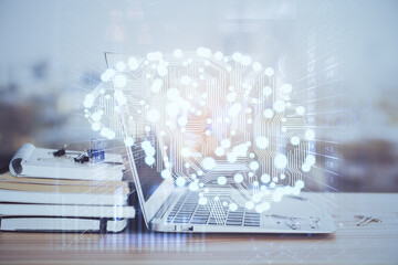 Multi exposure of work table with computer and brain hologram. Brainstorm concept.