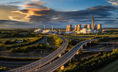 M62 and A1  Motorway in Yorkshire, England drone aerial photo showing  junction 32A near Ferrybridge and Castleford showing the Ferrybridge C Power Station and cooling towers